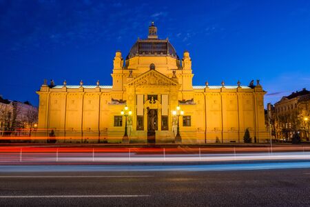 Croatia, city of Zagreb, art pavilion and car lights trails in the night, long exposureのeditorial素材