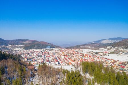 Croatia, town of Delnice in Gorski kotar, panoramic view of town center from drone in winter, mountain landscape in backgroundの写真素材