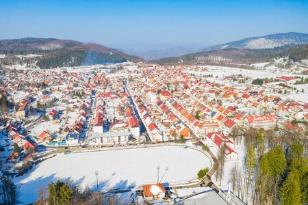 Croatia, town of Delnice in Gorski kotar, panoramic view of town center from drone in winter, mountain landscape in backgroundの写真素材