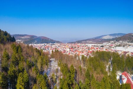 Croatia, town of Delnice in Gorski kotar, panoramic view of town center from drone in winter, mountain landscape in backgroundの写真素材