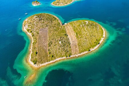 Croatia, Adriatic sea, aerial drone view of the amazing heart shaped island of Galesnjak, beautiful coastlineの写真素材