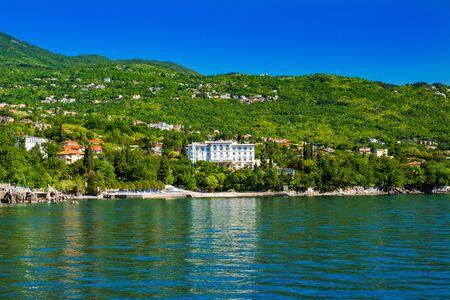 Beautiful Adriatic sea in Croatia, town of Lovran riviera, coastline villas in Kvarner bayの写真素材