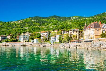 Beautiful Adriatic sea in Croatia, town of Lovran riviera, coastline villas in Kvarner bayの写真素材