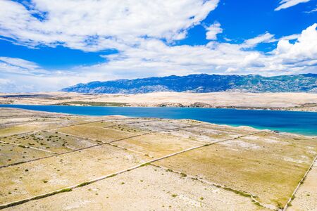 Croatia, Adriatic island of Pag, panoramic view of old agriculture fields and beautiful stone wallsの写真素材