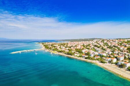 Croatia, beautiful Adriatic town of Novalja on the island of Pag, aerial view from droneの写真素材