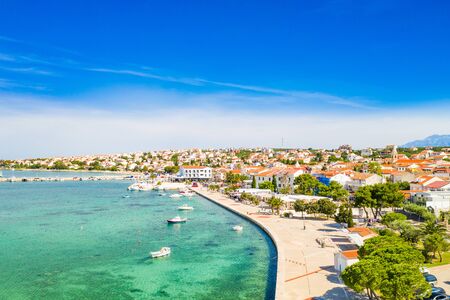 Croatia, beautiful Adriatic town of Novalja on the island of Pag, aerial view from droneの写真素材