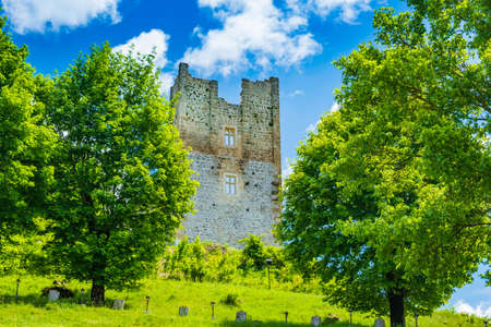 Croatia, region of Lika, beautiful green countryside landscape and Brinje castle ruinsのeditorial素材
