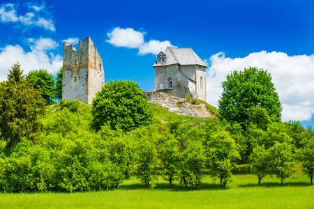 Croatia, region of Lika, beautiful green countryside landscape and Brinje castle ruinsのeditorial素材