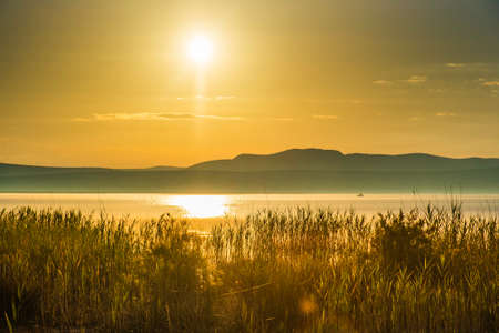 Sunrise over the beautiful ornithological nature park Vrana lake (Vransko jezero) in Dalmatia, Croatiaの写真素材