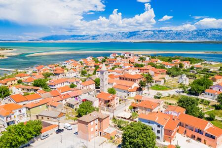 Panoramic view of the old town on Nin on Adriatic coast in Croatia, seascape and Velebit mountain in backgroundの写真素材