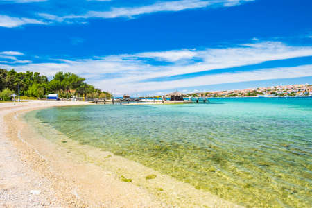 Adriatic sea shore in Croatia on Pag island, beautiful sand beach in town of Novaljaの写真素材