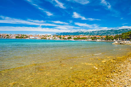 Croatia, town of Novalja on the island of Pag, marina and turquoise sea in foreground, tourist destination on Adriatic seaの写真素材