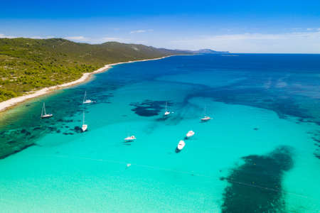 Amazing Adriatic sea in Croatia. Aerial view of azure turquoise lagoon on Sakarun beach on Dugi Otok island, yachts anchored blue sea, tourist paradise.の写真素材