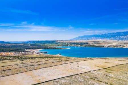 Croatia, aerial view of the beautiful Zrce beach and old dry walls on Pag island on Adriatic seaの写真素材