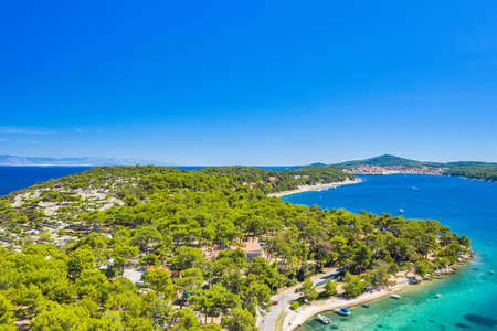 Drone aerial view of the island of Losinj, beautiful Adriatic coastline and town of Mali Losinj in background. Kvarner bay, Croatia, Europe.の写真素材