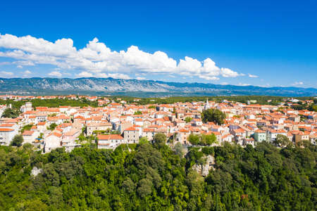 Aerial view of the old town of Omisalj on high cliff, Krk island, Kvarner, Croatiaの写真素材