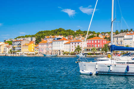 Seafront and sailboats in town of Mali Losinj on the island of Losinj, Adriatic coast in Croatia, popular touristic destinationの写真素材