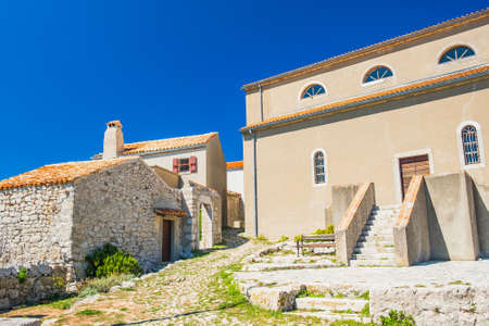 Ancient coastal town of Lubenice on the island of Cres in Croatia, cobbled streets and old housesの写真素材
