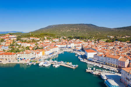 Seafront and marina with boats in the town of Cres, Island of Cres, Kvarner, Croatiaの写真素材