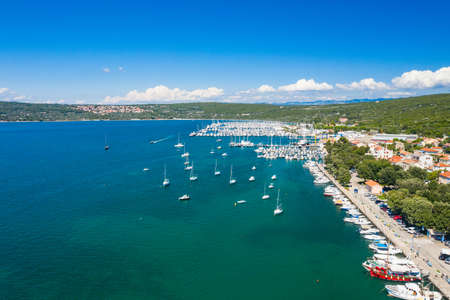 Marina and seafront in town of Punat on Krk island, Kvarner bay, Croatia, aerial view from droneのeditorial素材