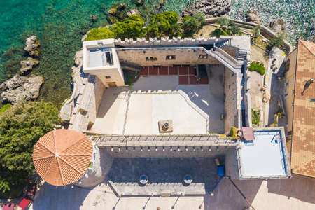 Old medieval city walls and castle in town of Krk in Croatia, drone aerial viewのeditorial素材