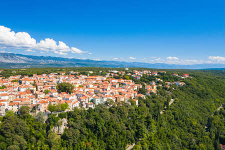 Aerial view of the old town of Omisalj on high cliff, Krk island, Kvarner, Croatiaの写真素材
