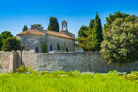 Beautiful ancient town of Osor on the island of Cres in Croatia, stone walls and cathedral towerのeditorial素材