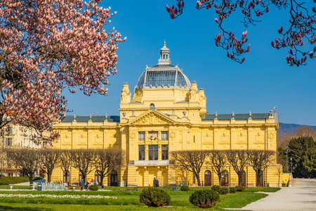 Colorful magnolia blossom and monumental architecture in spring in Zagreb, Croatiaのeditorial素材