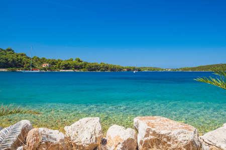 Turquoise lagoon on Adriatic coast in Croatia. Beautiful Mediterranean landscape. Soline bay on Dugi...