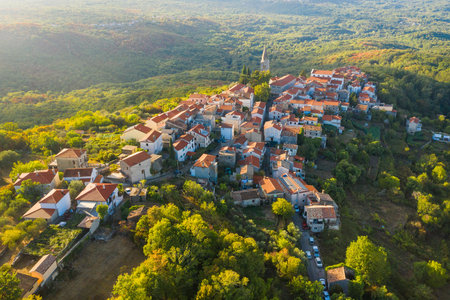 Sunset over the old town of Dobrinj on Krk island in Croatia, aerial viewの写真素材