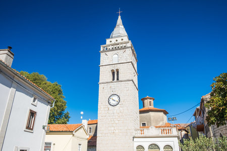 Tower bell of the Church of the Assumption of the Blessed Virgin Mary in Omisalj, Croatiaの写真素材