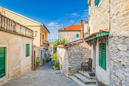 A narrow street among the old houses of Kotor, Montenegroの写真素材