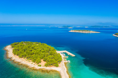 Turquoise sea, islands in Murter archipelago in Dalmatia, Croatiaの写真素材