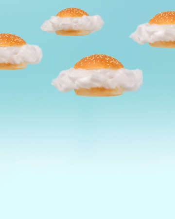 White clouds inside burger buns floating against blue sky background. Surreal fast food group concept. Minimal abstract summer healthy diet food idea.の写真素材