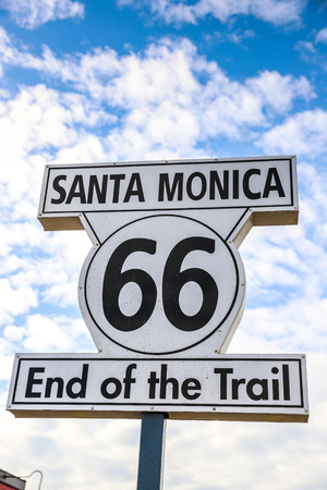 Route 66 End of the Trail sign in Santa Monica Pier, California, USAの写真素材