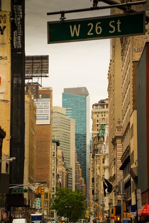 Street sign and moody sky in Manhattan, New York, on a rainy dayのeditorial素材