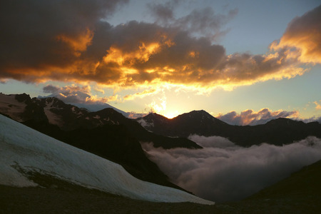 Golden sunset in the mountains, an interesting journey, mountain hiking, outdoors in ray ridge, wonderful experiencesの写真素材