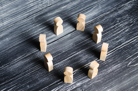 People stand in a circle and discuss. Concept business ideas, cooperation, teamwork, training and training. Solving problems and tasks. Businessmen gathered in a circle for a meeting.の写真素材