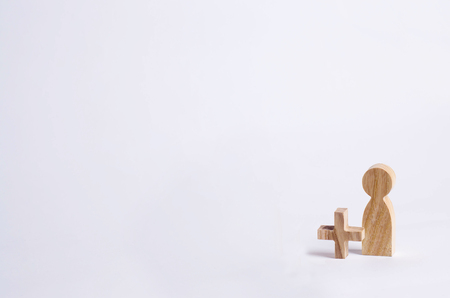 Two people with a plus in between. Wooden figures of persons. Friends, relatives, lovers. Social mathematics. Partner. Man plus man on white background. A new person, Improvisationの写真素材