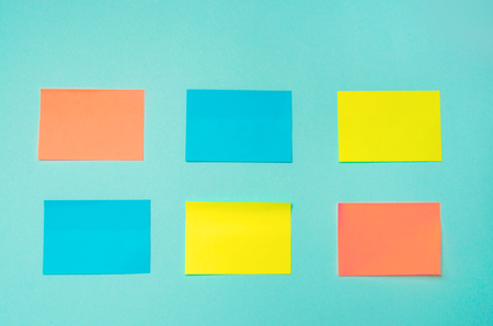 sticky stickers for notes on a blue background. time management, creative new idea. bad memory. reminder, place for textの写真素材
