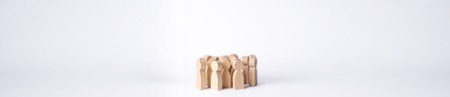 A crowd of people on a white background. People stand in the crowd and discuss. Cooperation and work...