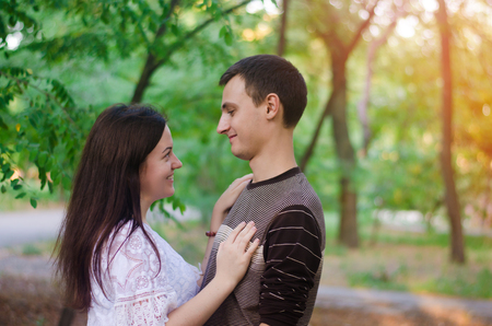 couple of lovers in nature. boy and girl. love, relationships, feelings. lovers. selective focusの写真素材