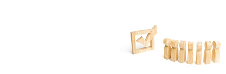 wooden human figures stand in a row next to government building in the box. concept of elections and...