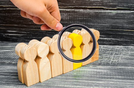 the person leaves / stands out from the crowd. leadership in the business team. a talented worker. special opinion. the chosen one among others. Promotion. Concept of search for worker. recruitingの写真素材
