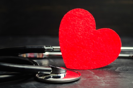 Red heart and stethoscope. The concept of medicine and health insurance, family, life. Ambulance....