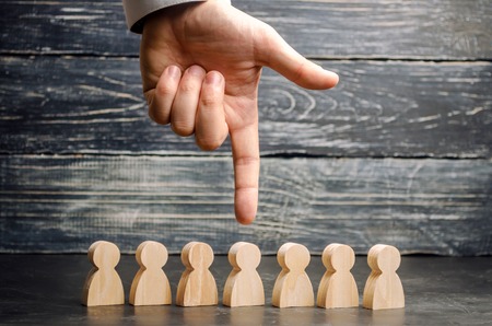 Businessman in search of new employees and specialists. The concept of personnel selection and management within the team. Dismissal and hiring people to work. Human Resource Management.の写真素材