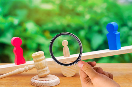 deprivation of parental rights. concept of custody of a child. legal divorce. hammer of a judge. family court, law. parents stand on scales. trialの写真素材