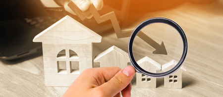 a decline in property prices. population decline. falling interest on the mortgage. reduction in demand for the purchase of housing. low energy efficiency. low prices for public utilitiesの写真素材