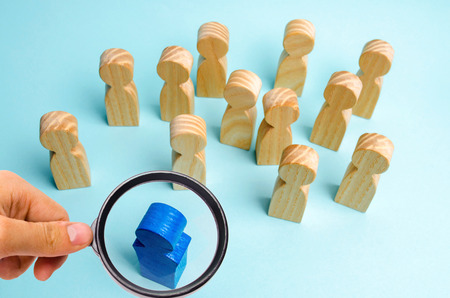 The leader communicates with the team and gives instructions. Business planning and goal setting. Teamwork. Team spirit. Human Resource Management. The dismissal of an employee. Promotion of the post.の写真素材