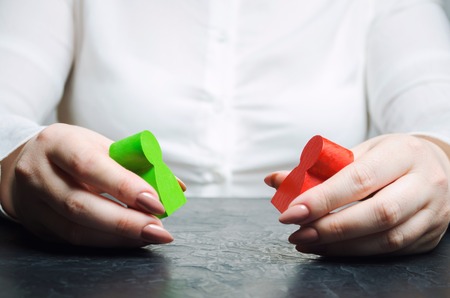 The woman arbitrator examines the conflict situation between people. Conflict of interest. Search...